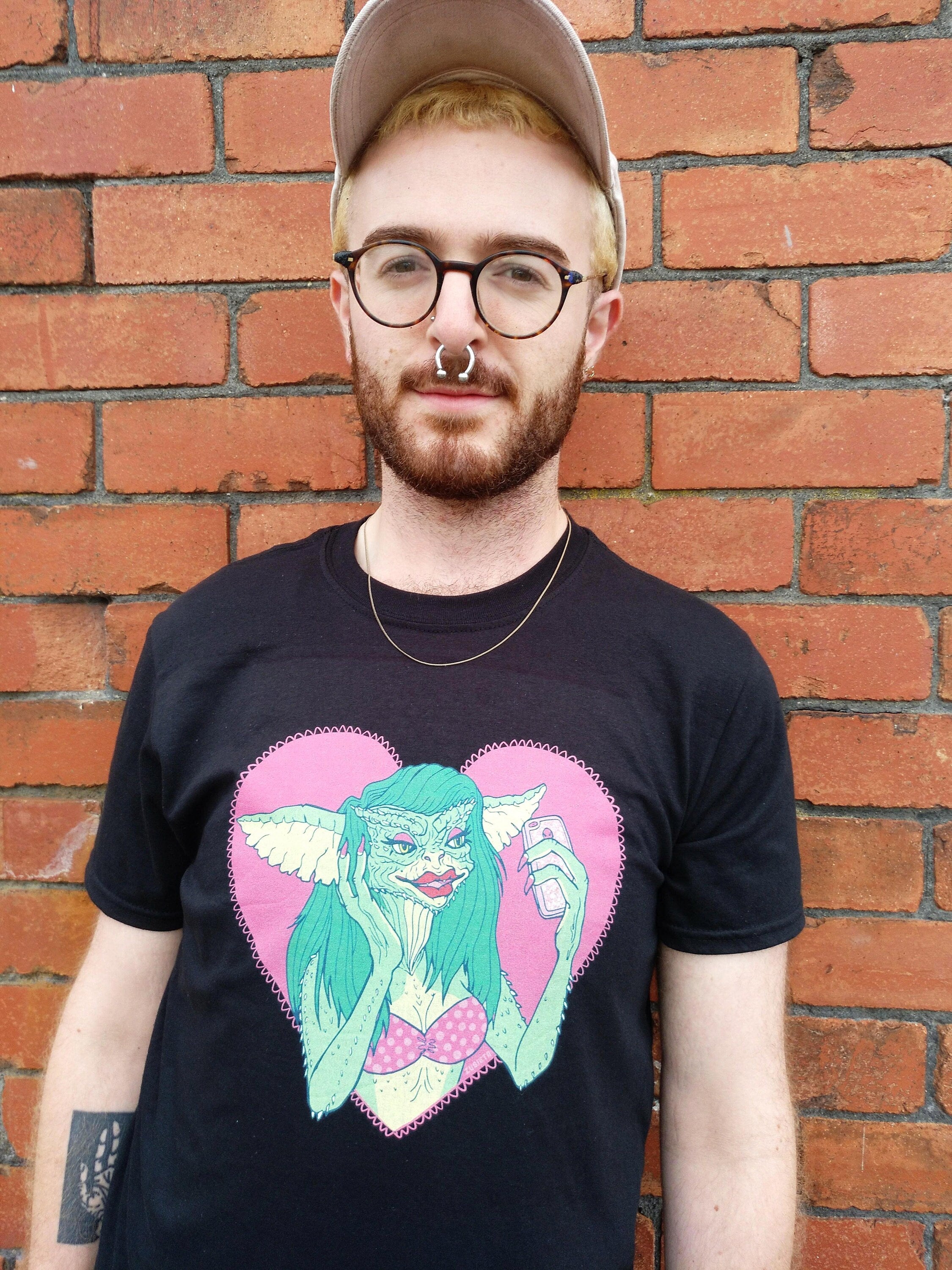 Greta the Gremlin t-shirt featuring a vibrant design inspired by the movie, made from 100% cotton with high-quality print.