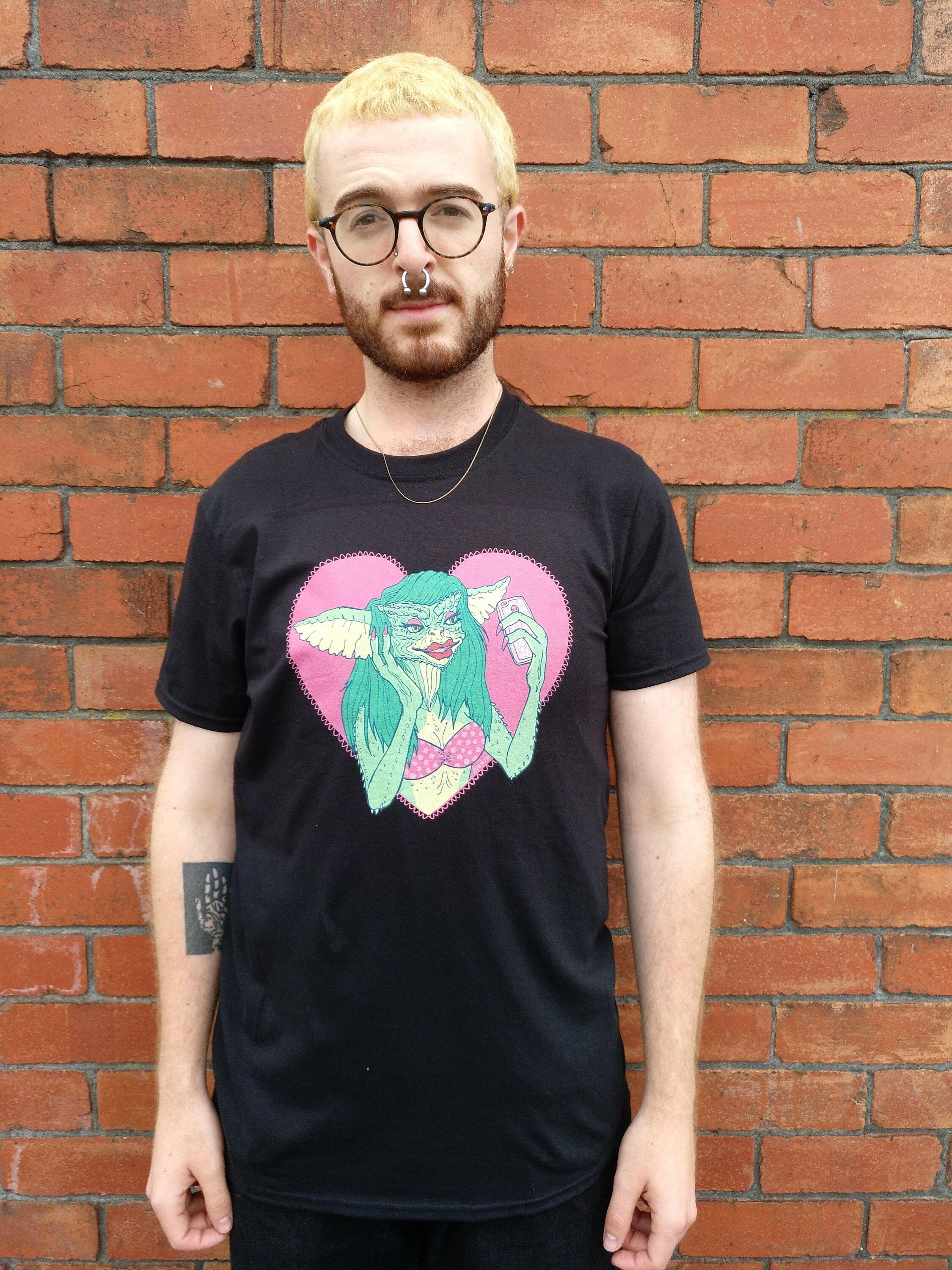 Greta the Gremlin t-shirt featuring a vibrant design inspired by the movie, made from 100% cotton with high-quality print.