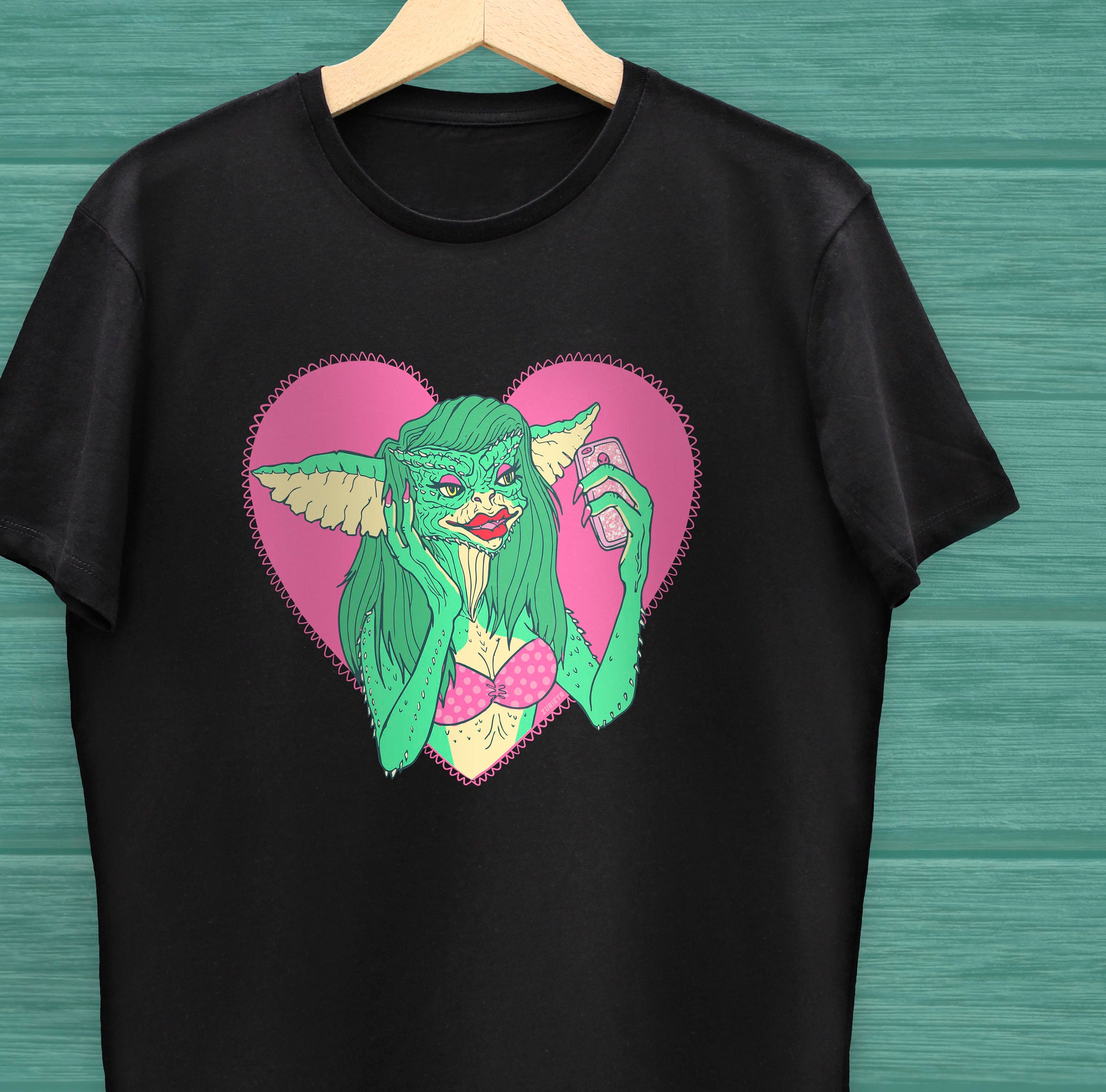 Greta the Gremlin t-shirt featuring a vibrant design inspired by the movie, made from 100% cotton with high-quality print.