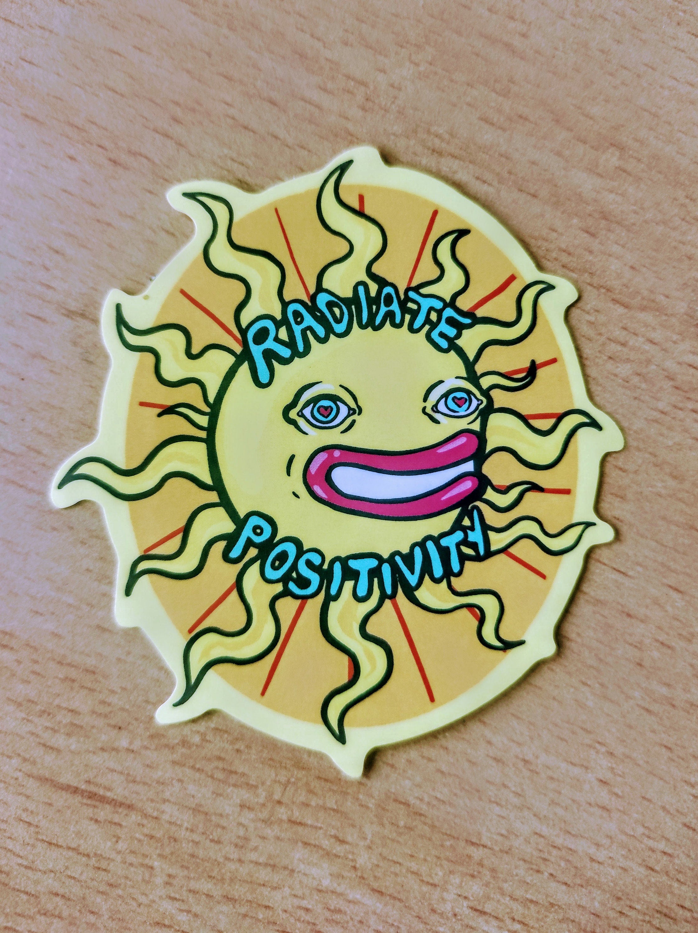 A vibrant Happy Sun Sticker featuring a psychedelic design, perfect for laptops, notebooks, and cars.