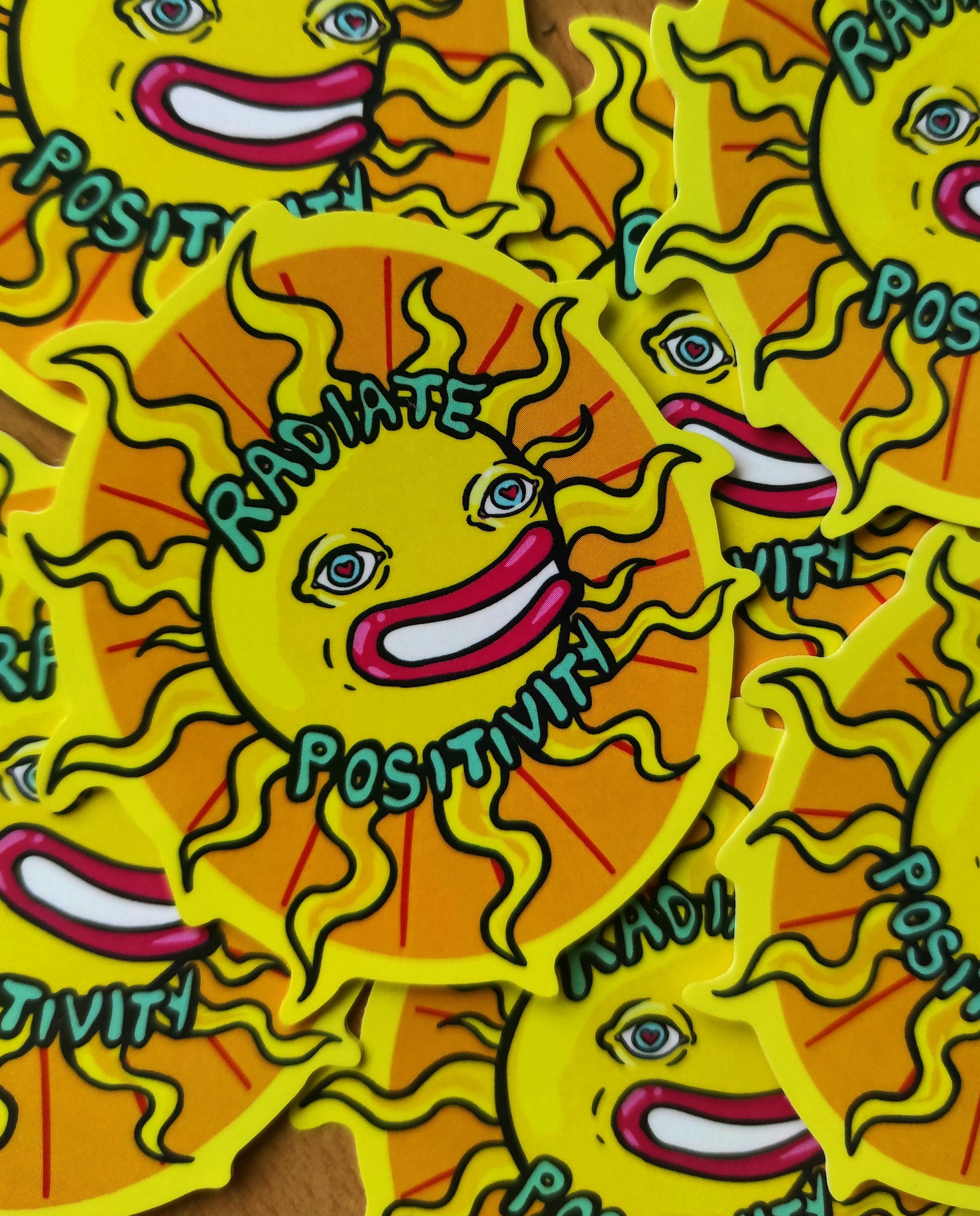 A vibrant Happy Sun Sticker featuring a psychedelic design, perfect for laptops, notebooks, and cars.