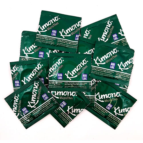 Kimono MicroThin condoms with Aqua Lube, showcasing their ultra-thin design and smooth texture.