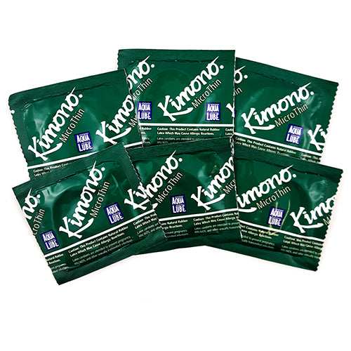 Kimono MicroThin condoms with Aqua Lube, showcasing their ultra-thin design and smooth texture.