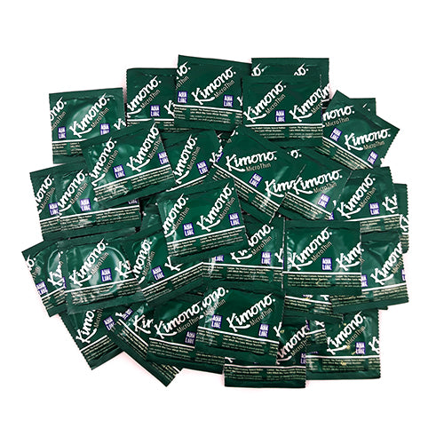 Kimono MicroThin condoms with Aqua Lube, showcasing their ultra-thin design and smooth texture.