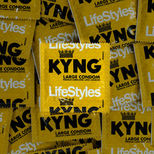 LifeStyles KYNG condoms in a sleek packaging, showcasing their larger size and smooth texture.