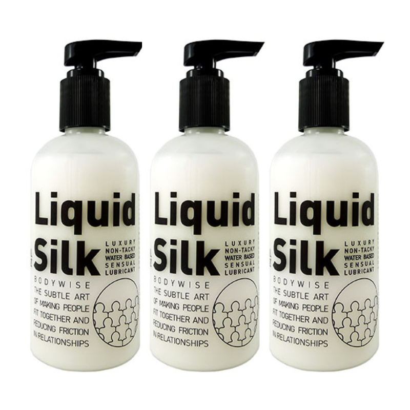 Three 250ml bottles of Liquid Silk water-based lubricant, showcasing a sleek design and luxurious branding.