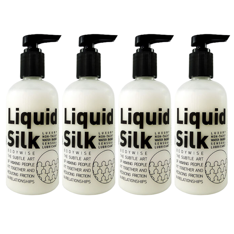 Four 250ml bottles of Liquid Silk water-based lubricant, showcasing its elegant packaging and luxurious design.