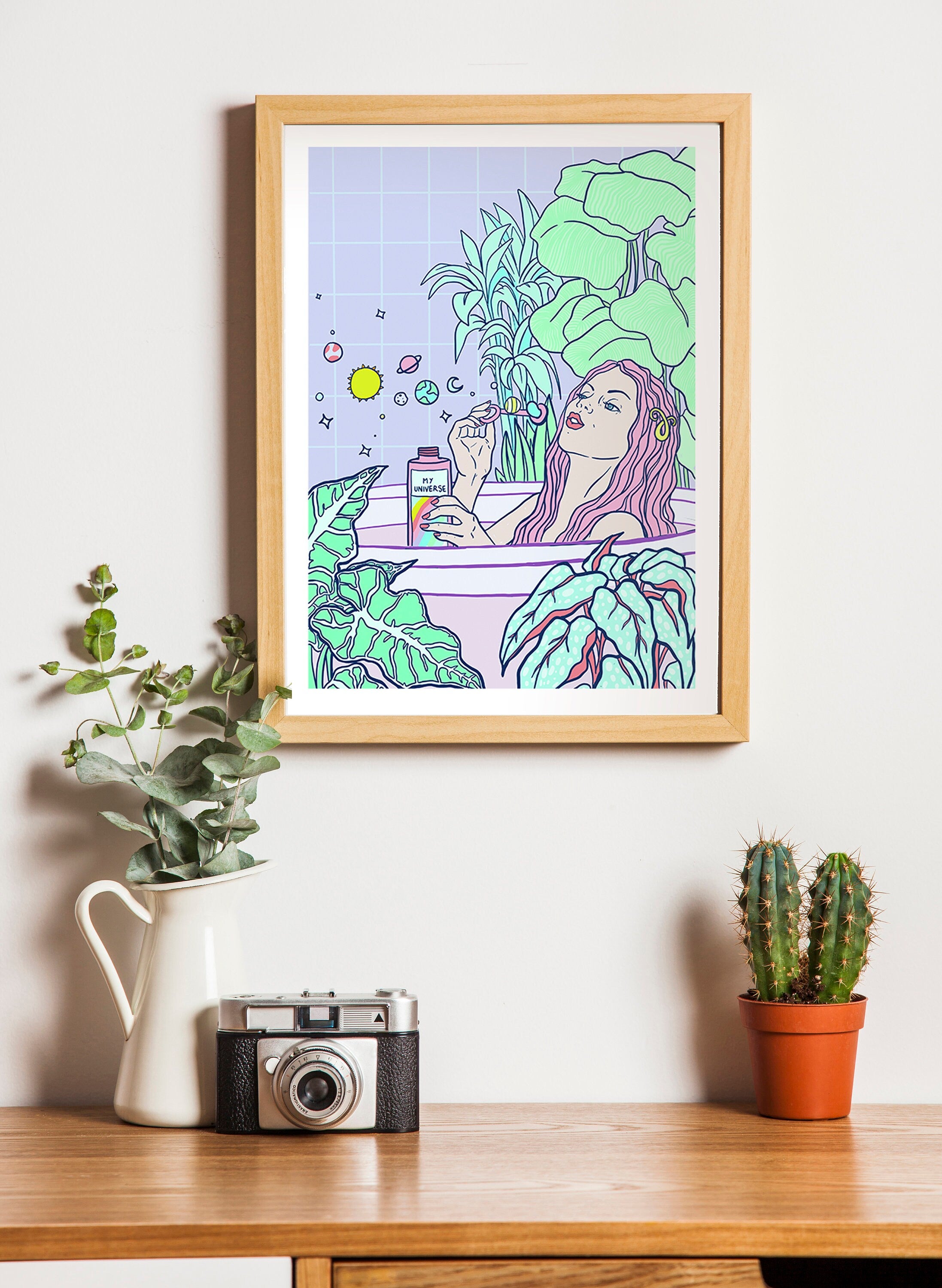 My Universe fine art print showcasing self-care and womanhood, featuring vibrant colors and a white margin with a handwritten signature.