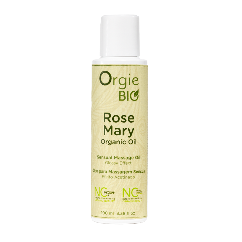 Bottle of Orgie Bio Rosemary Organic Massage Oil 100ml with a rosemary plant in the background, showcasing its natural ingredients.