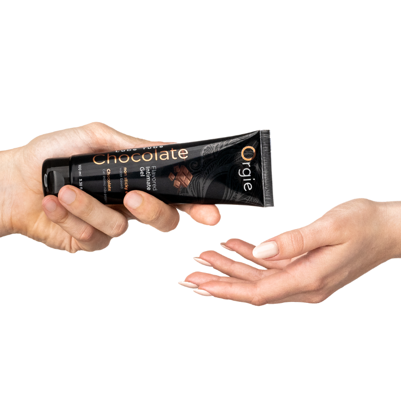 Orgie Lube Tube Chocolate 100ml, a water-based lubricant with a rich chocolate flavor, perfect for enhancing intimate moments.