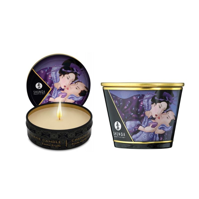 Shunga Libido Massage Candlelight in Exotic Fruits scent, showcasing a beautifully designed candle with a warm glow, perfect for romantic settings.