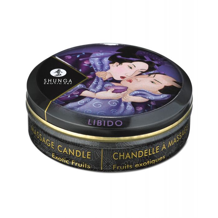 Shunga Libido Massage Candlelight in Exotic Fruits scent, showcasing a beautifully designed candle with a warm glow, perfect for romantic settings.