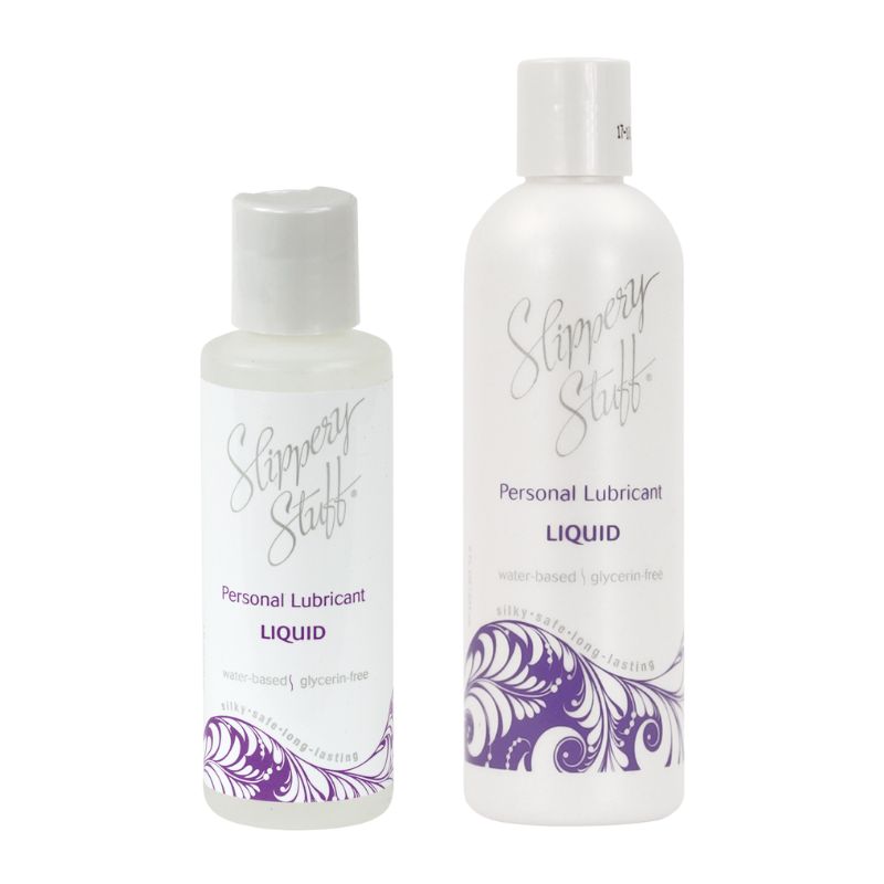 Bottle of Slippery Stuff Liquid personal lubricant on a neutral background, showcasing its sleek design and label.