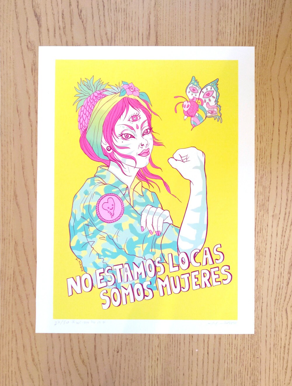 Somos Mujeres Tribute to Rosie the Riveter print featuring vibrant colors and empowering imagery, hand-signed with a white margin.