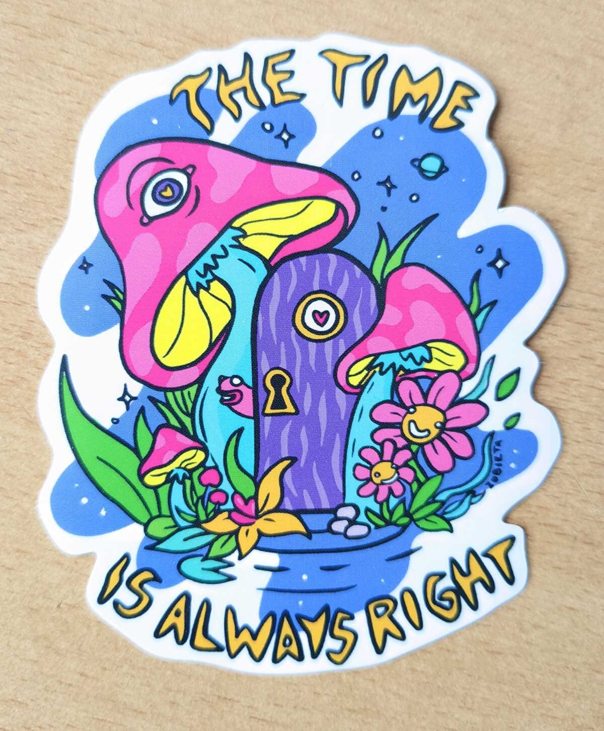 Colorful vinyl sticker featuring psychedelic mushrooms and a rainbow design, perfect for personalizing items.