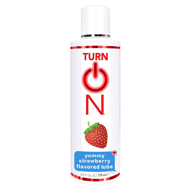 Turn On Yummy Strawberry Flavored Lubricant 178ml bottle with a vibrant strawberry design, showcasing its sweet and luscious appeal.