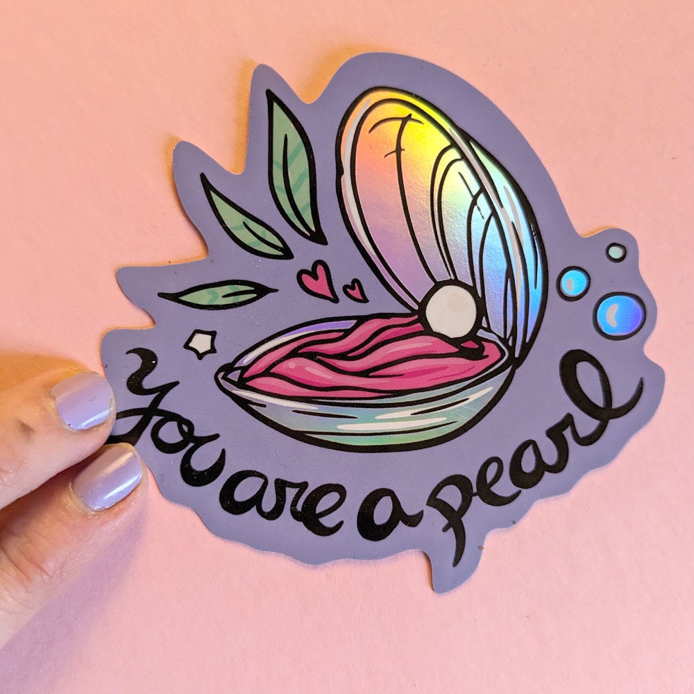 You Are a Pearl Holographic Vinyl Sticker featuring an oyster shell design with a shimmering holographic finish.