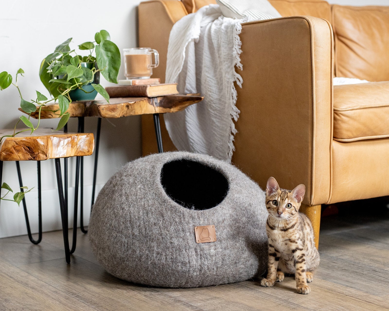 Earth Brown round style cat cave bed made from luxurious felted wool, designed for comfort and style, suitable for all cat sizes.