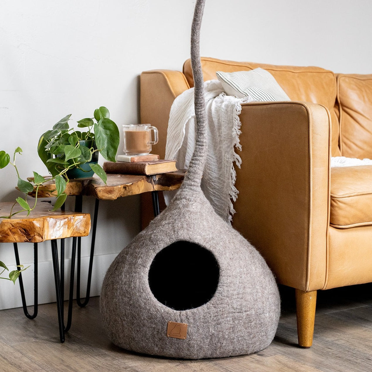 Earth Brown Tail Style Cave, a cozy and stylish cat cave made from premium felted wool, featuring a peekaboo entrance and modern design.