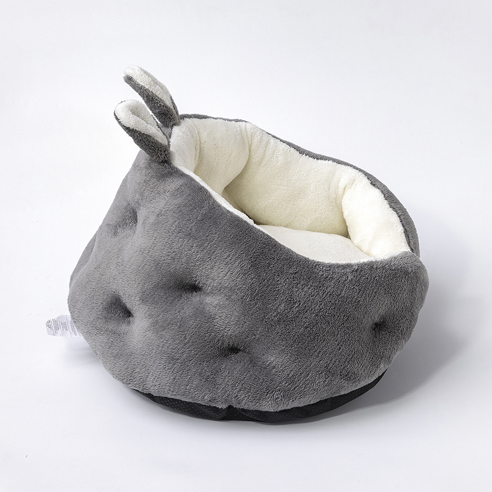 Bunny Ear Design Pet Bed featuring plush faux fur and non-slip bottom, perfect for small to medium pets.