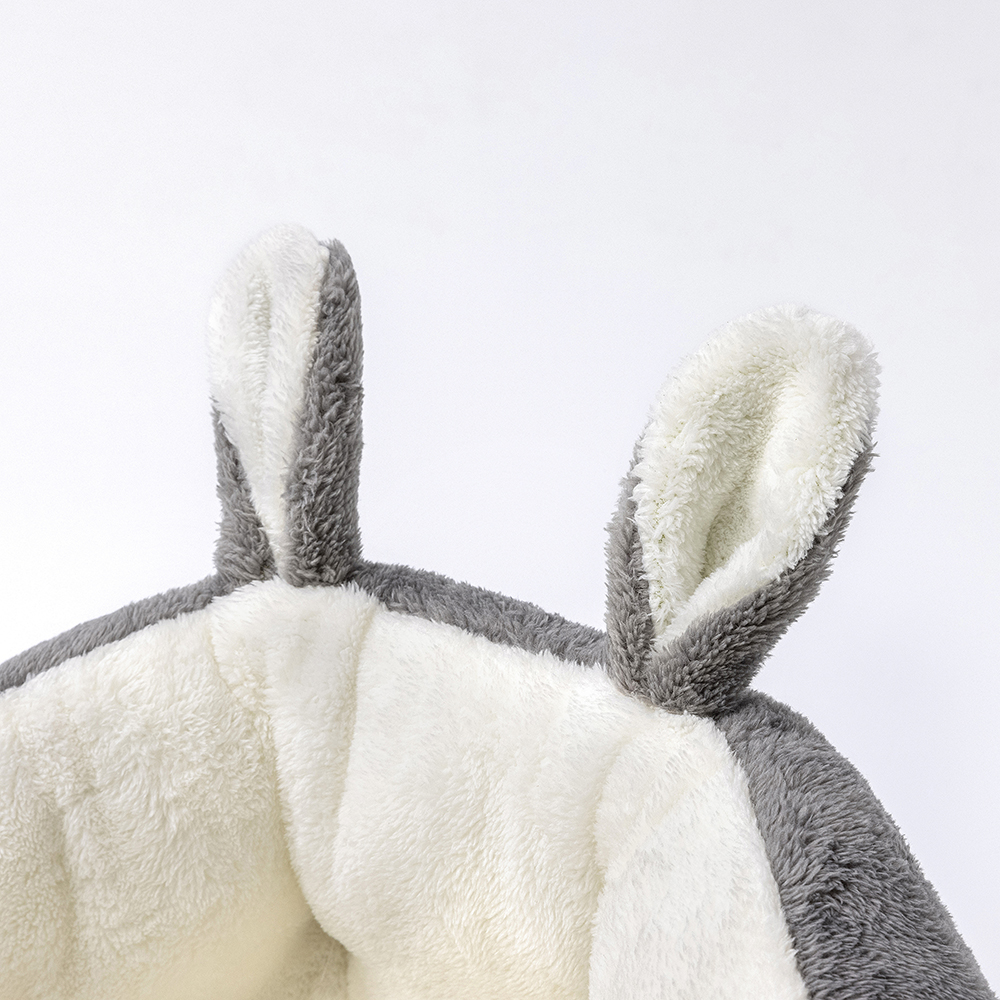 Bunny Ear Design Pet Bed featuring plush faux fur and non-slip bottom, perfect for small to medium pets.