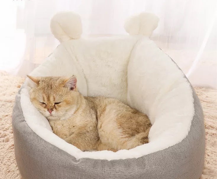 Grey medium cat bed sleeping bag, ultra-soft plush material with non-skid bottom, perfect for cozy naps.