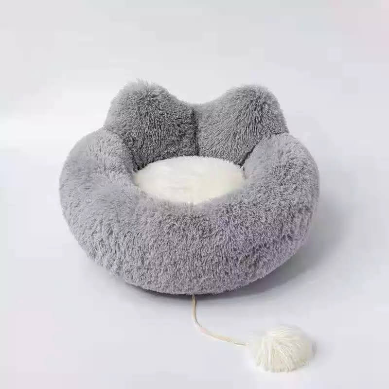 Cozy Plush Pet Bed in soft plush material, featuring a non-slip base, perfect for pets to curl up and relax.