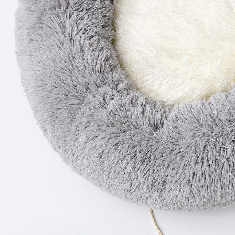 Cozy Plush Pet Bed in soft plush material, featuring a non-slip base, perfect for pets to curl up and relax.