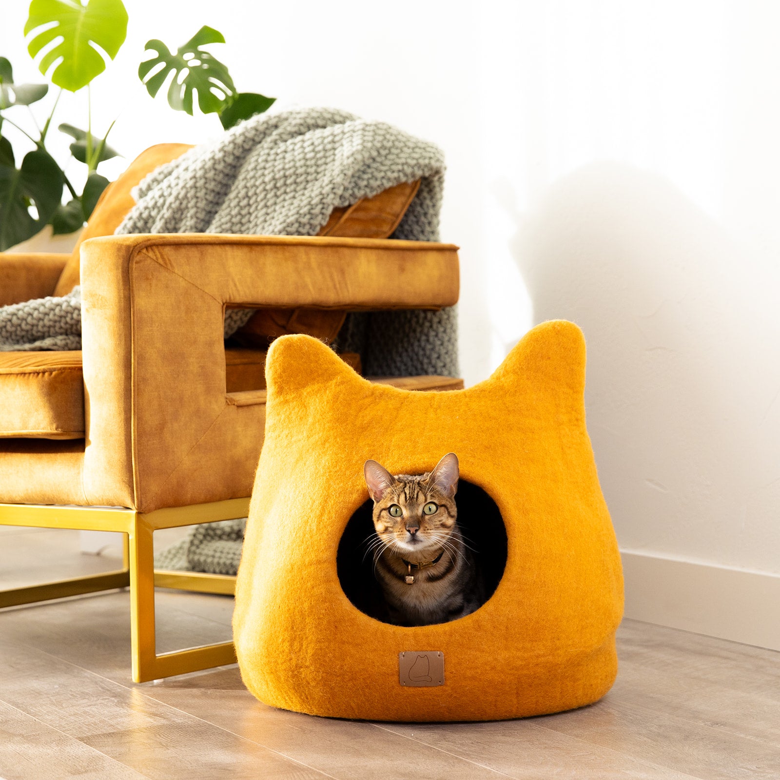 Fire Orange Ear Style Cave made of luxury felted wool, featuring a cozy design with a peekaboo opening, perfect for cats of all sizes.