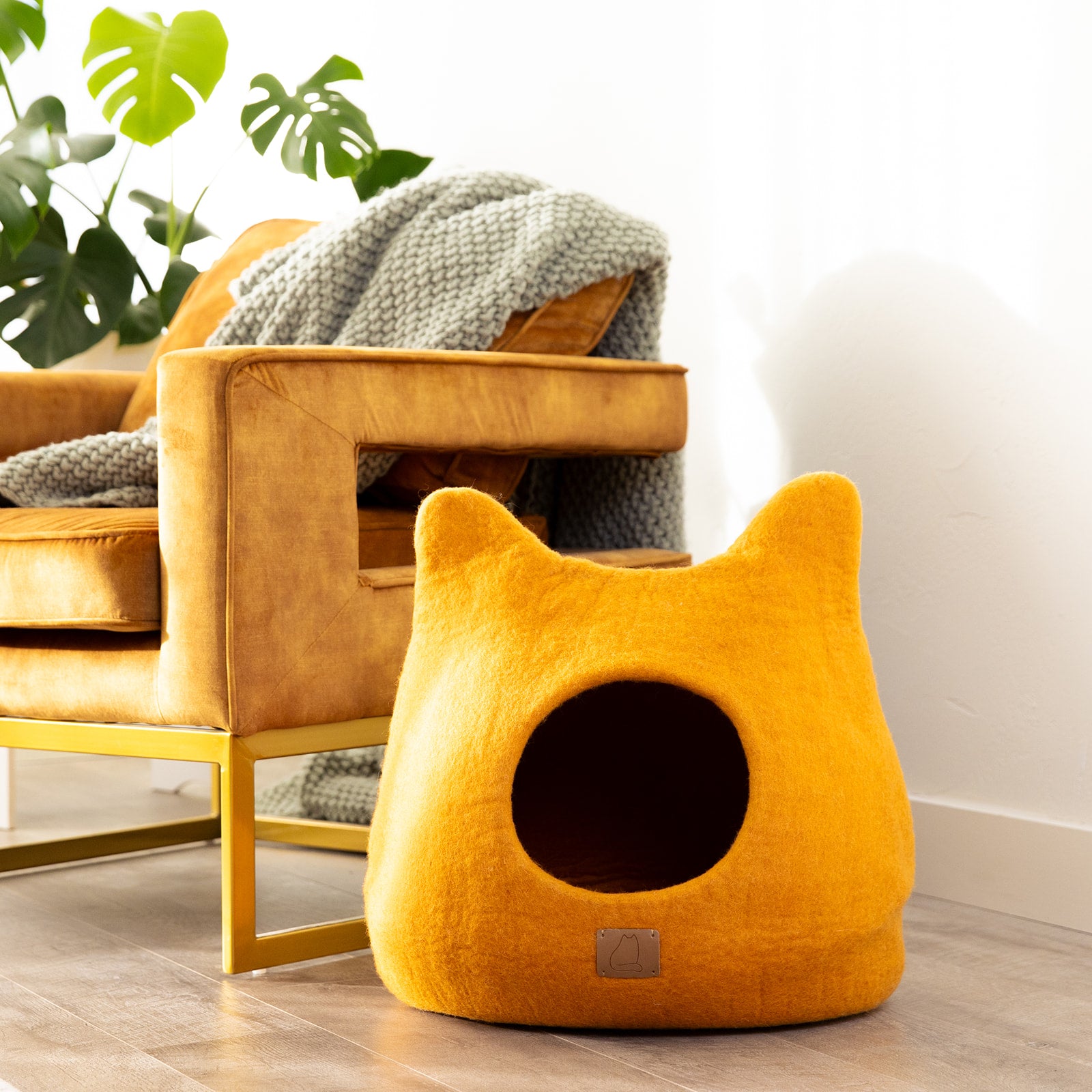 Fire Orange Ear Style Cave made of luxury felted wool, featuring a cozy design with a peekaboo opening, perfect for cats of all sizes.