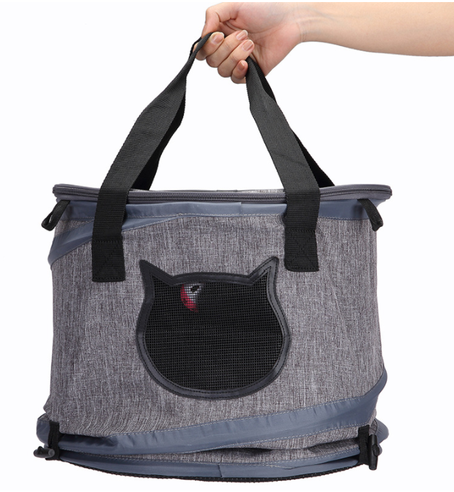 Foldable Pet Cat Carrier Bag in gray, featuring a skylight design, spacious interior for pets, and multiple storage pockets for travel essentials.