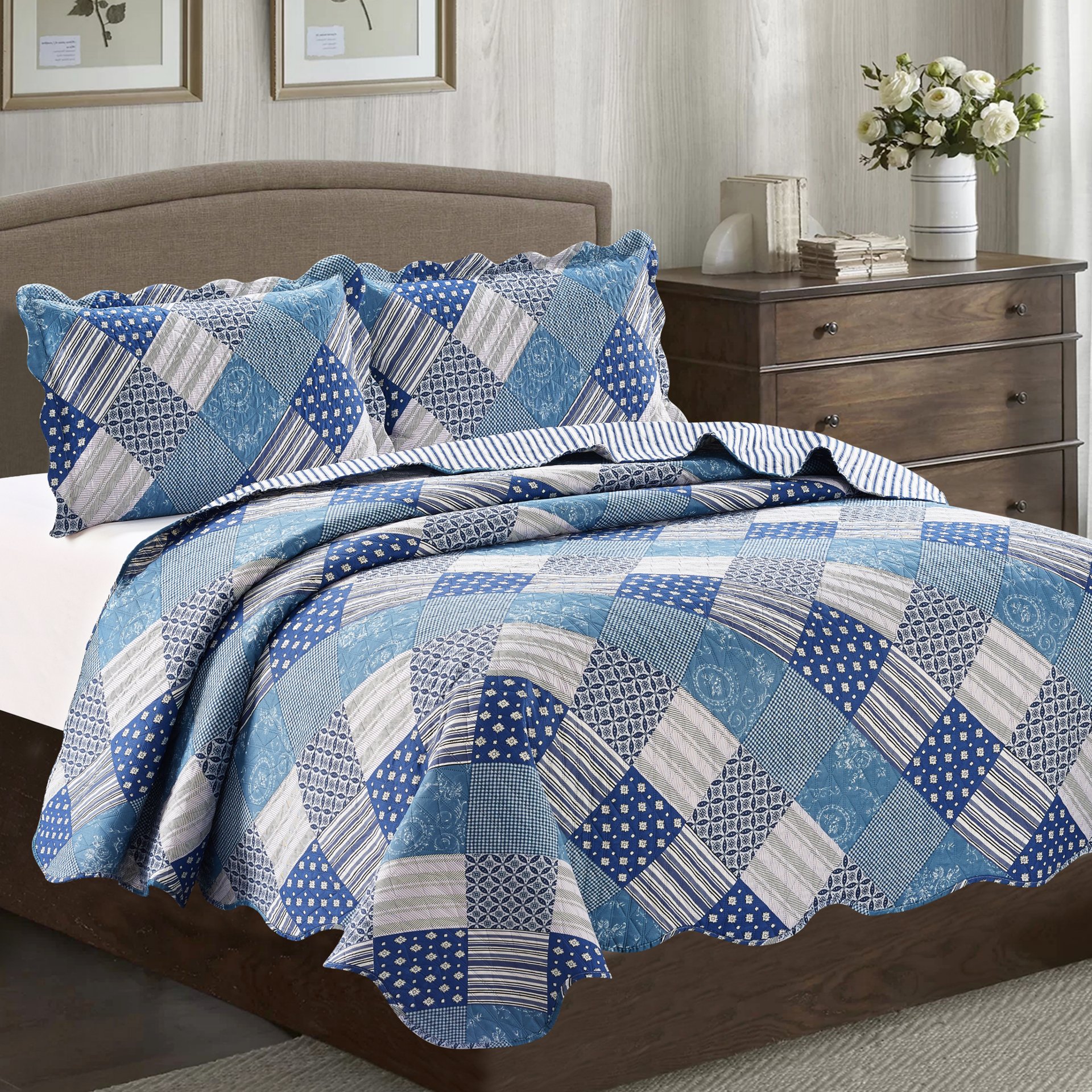 Jennifer 3 Piece Quilt Set in Blue, featuring a quilt and two matching pillow shams, elegantly styled for a cozy bedroom decor.