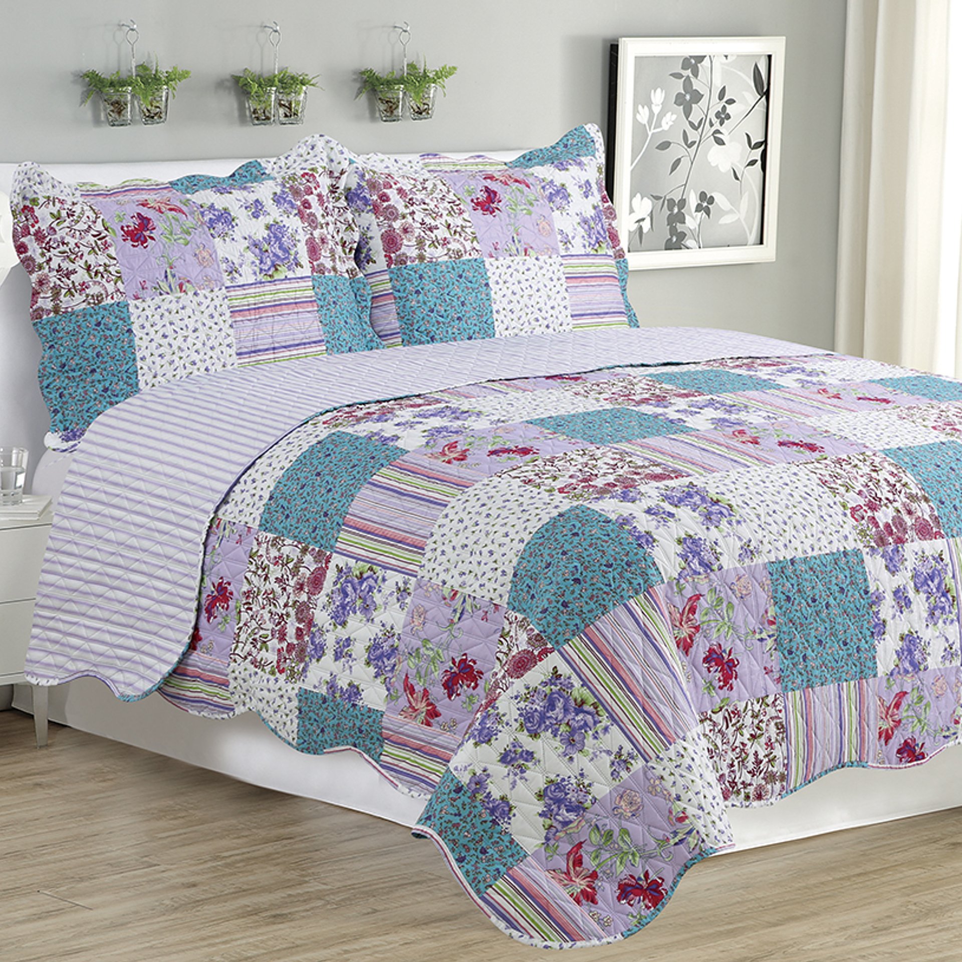 Kim 3 Piece Quilt Set in Purple featuring a quilt and two matching pillow shams, showcasing elegant design and soft fabric.