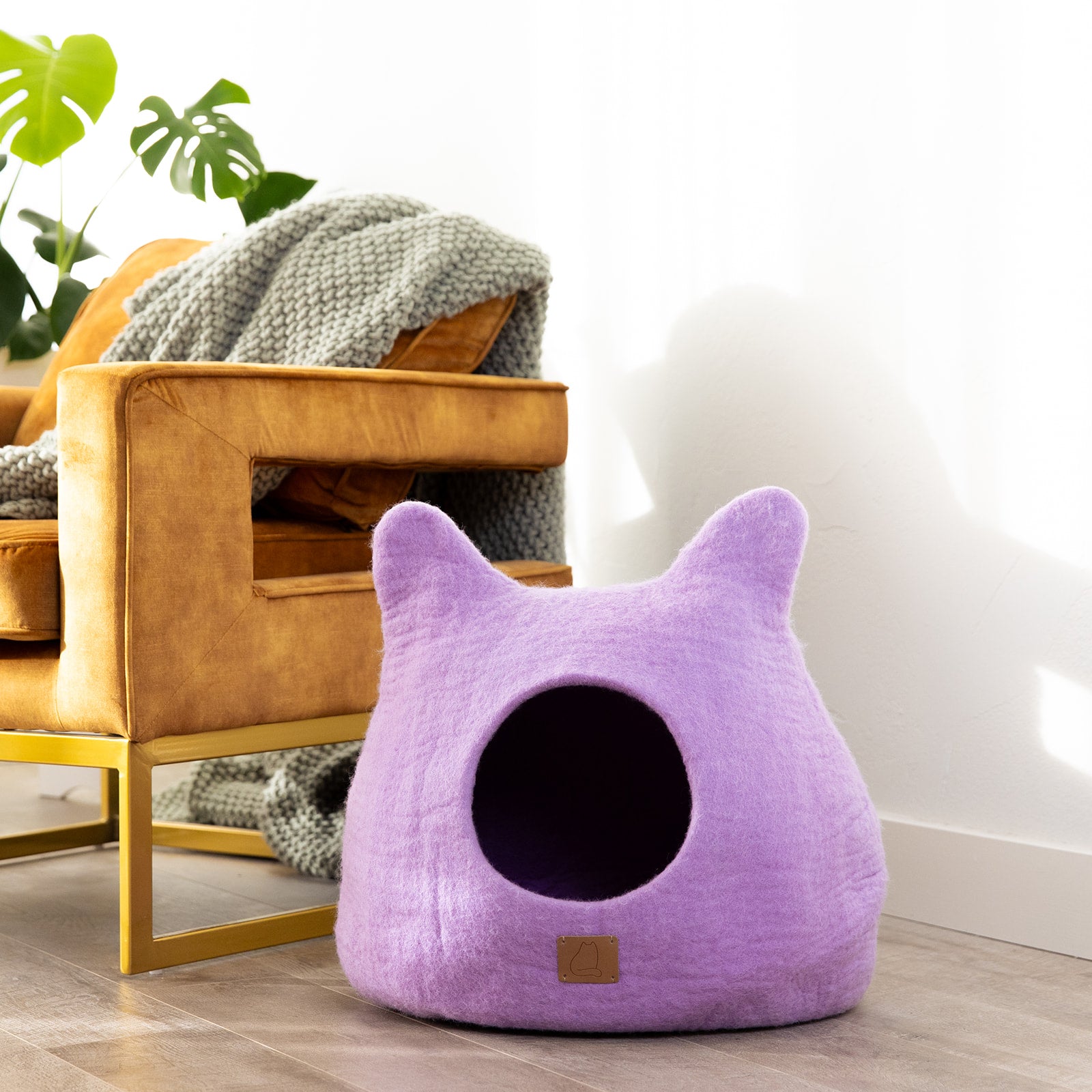 Lilac Purple Ear Style Cave made of felted wool, featuring a cozy design with a peekaboo opening, perfect for cats to snuggle and play.