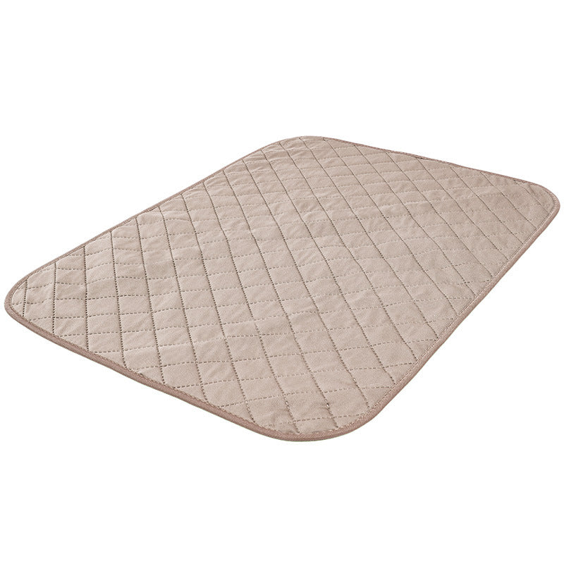 Natural Bamboo Fiber Pet Fixed-point Training Dog Pad in green and beige colors, showcasing its lightweight and portable design for pets.