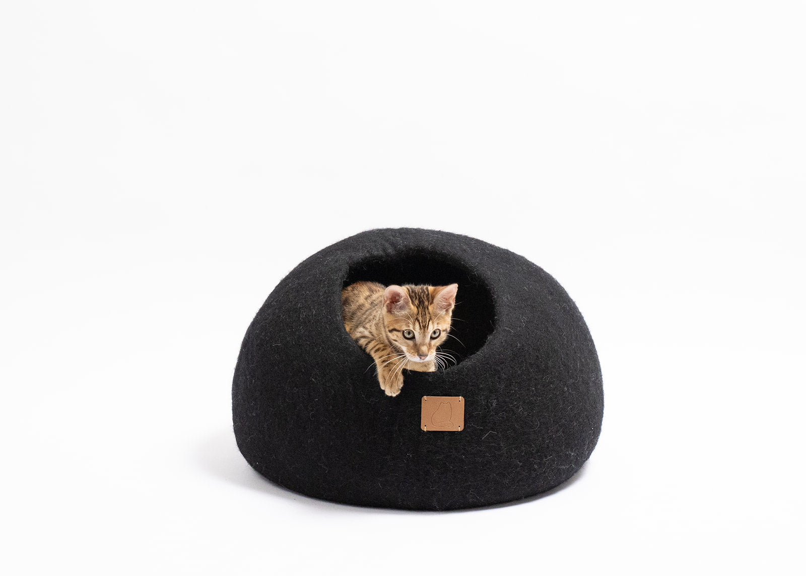 Night Black Round Style Cave, a luxurious felted wool cat bed designed for comfort and style, featuring a peekaboo round design.