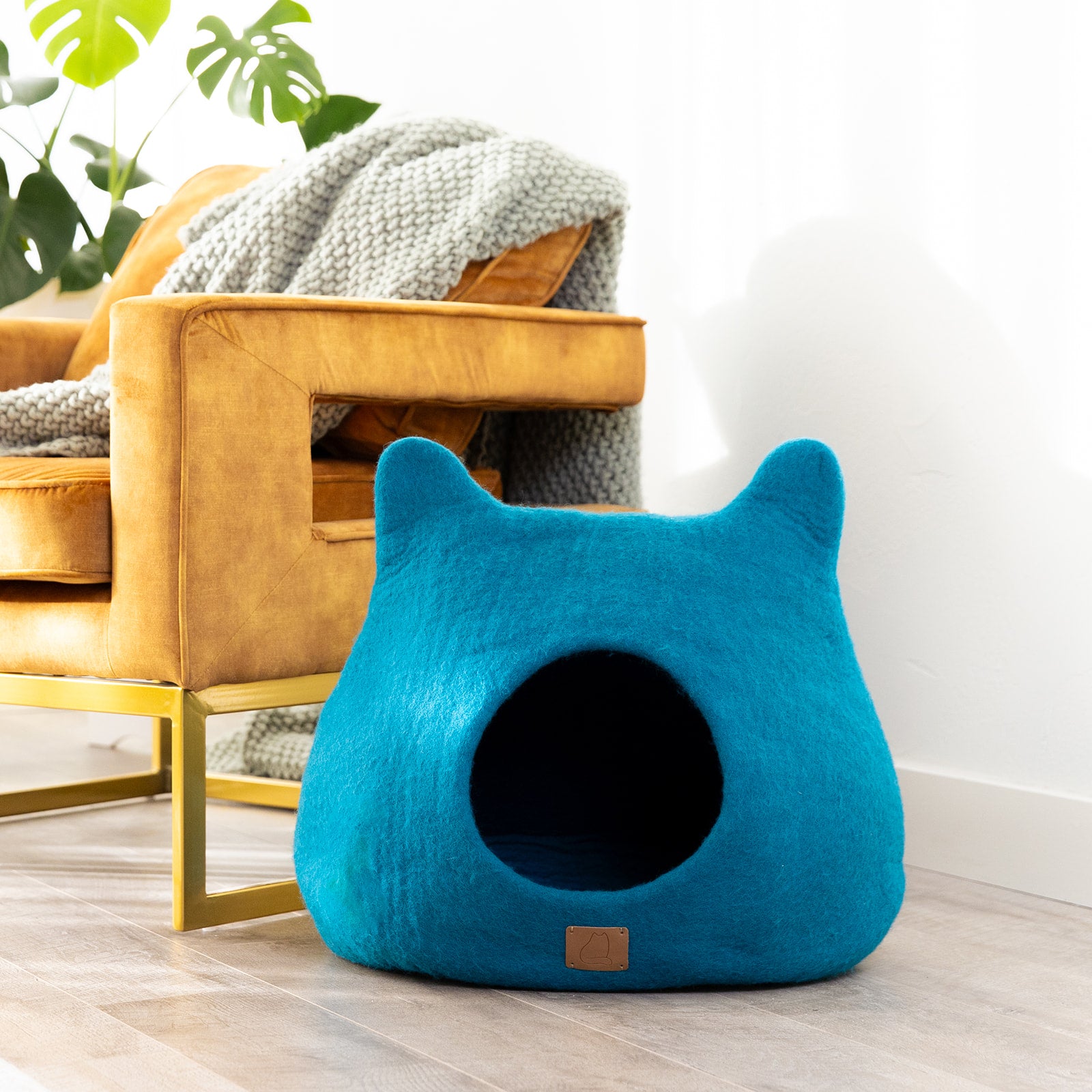 Ocean Blue Ear Style Cave made of luxurious felted wool, featuring a peekaboo design for cats, showcasing its elegant and cozy structure.