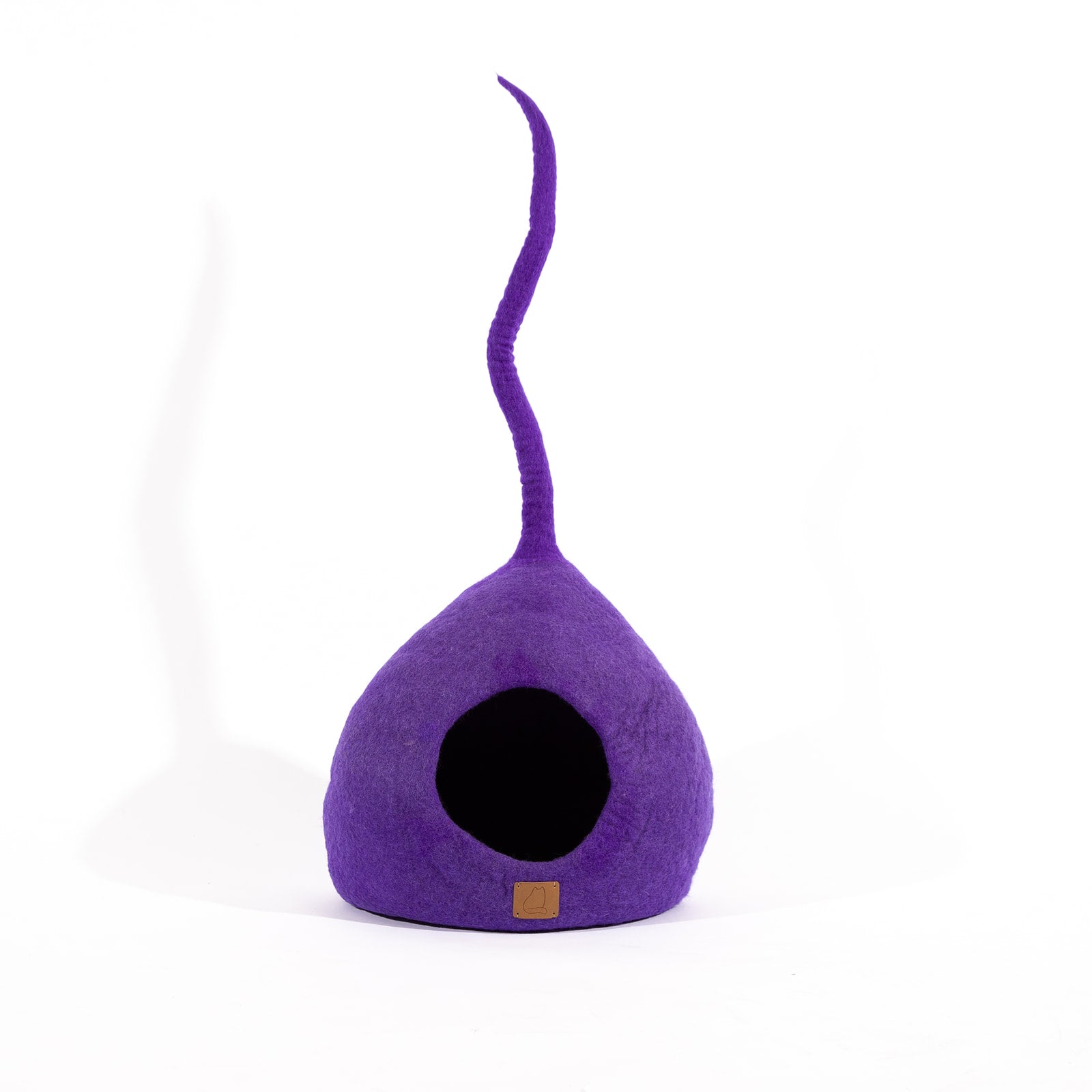 Plum Purple Tail Style Cave, a chic and cozy cat bed made from felted wool, featuring a peekaboo entrance and modern design.