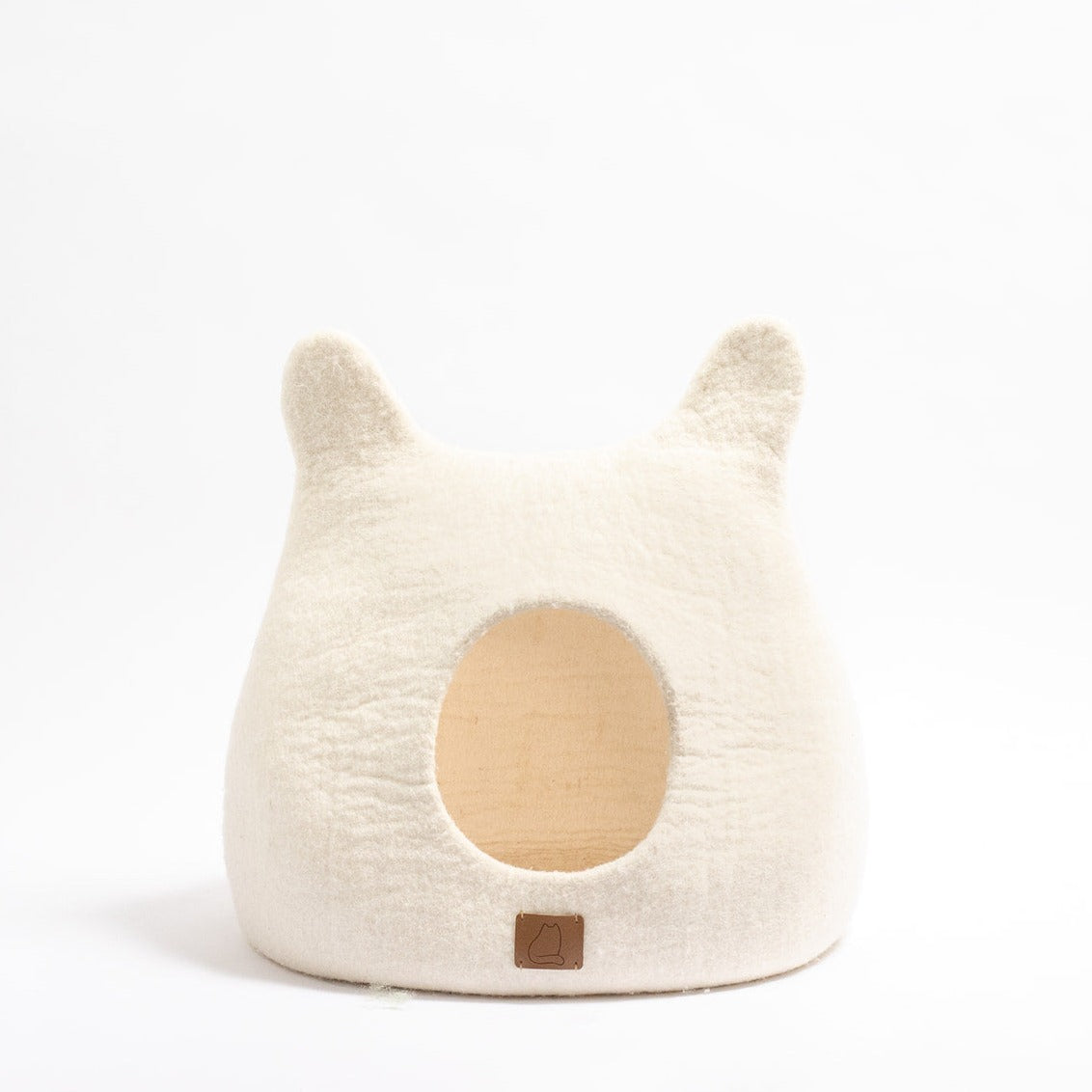 Snow White Ear Style Cave made of luxurious felted wool, featuring a cozy design with a peekaboo opening, perfect for cats of all sizes.