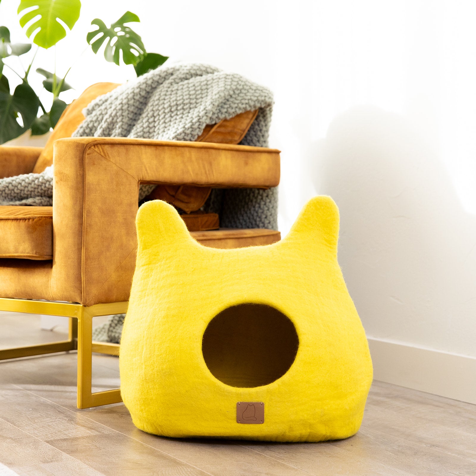 Sunny Yellow Ear Style Cave made of luxury felted wool, featuring a cozy design and peekaboo entrance, perfect for cats of all sizes.