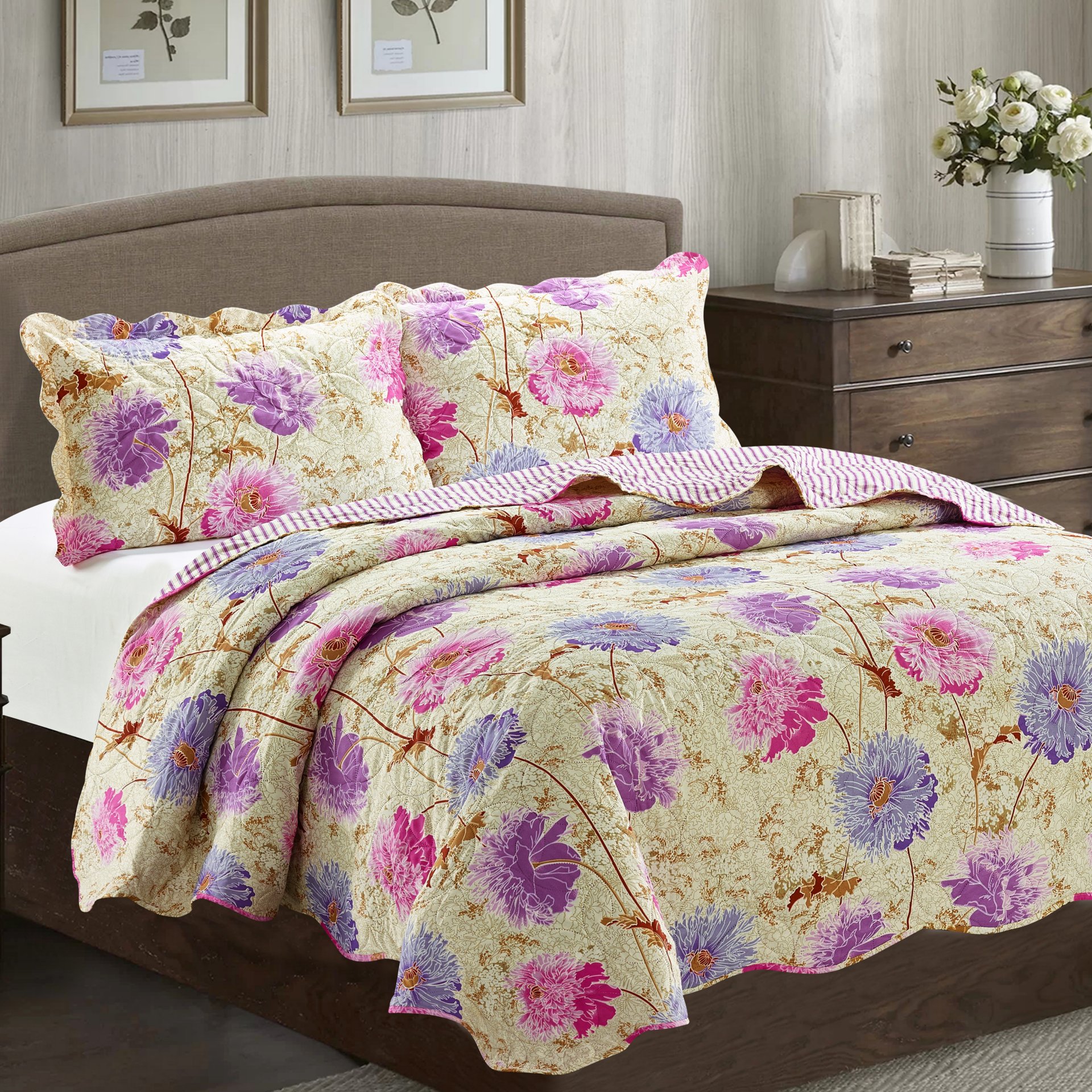 Suzy 3 Piece Quilt Set in Purple, featuring a quilt and two matching pillow shams, elegantly displayed on a bed.