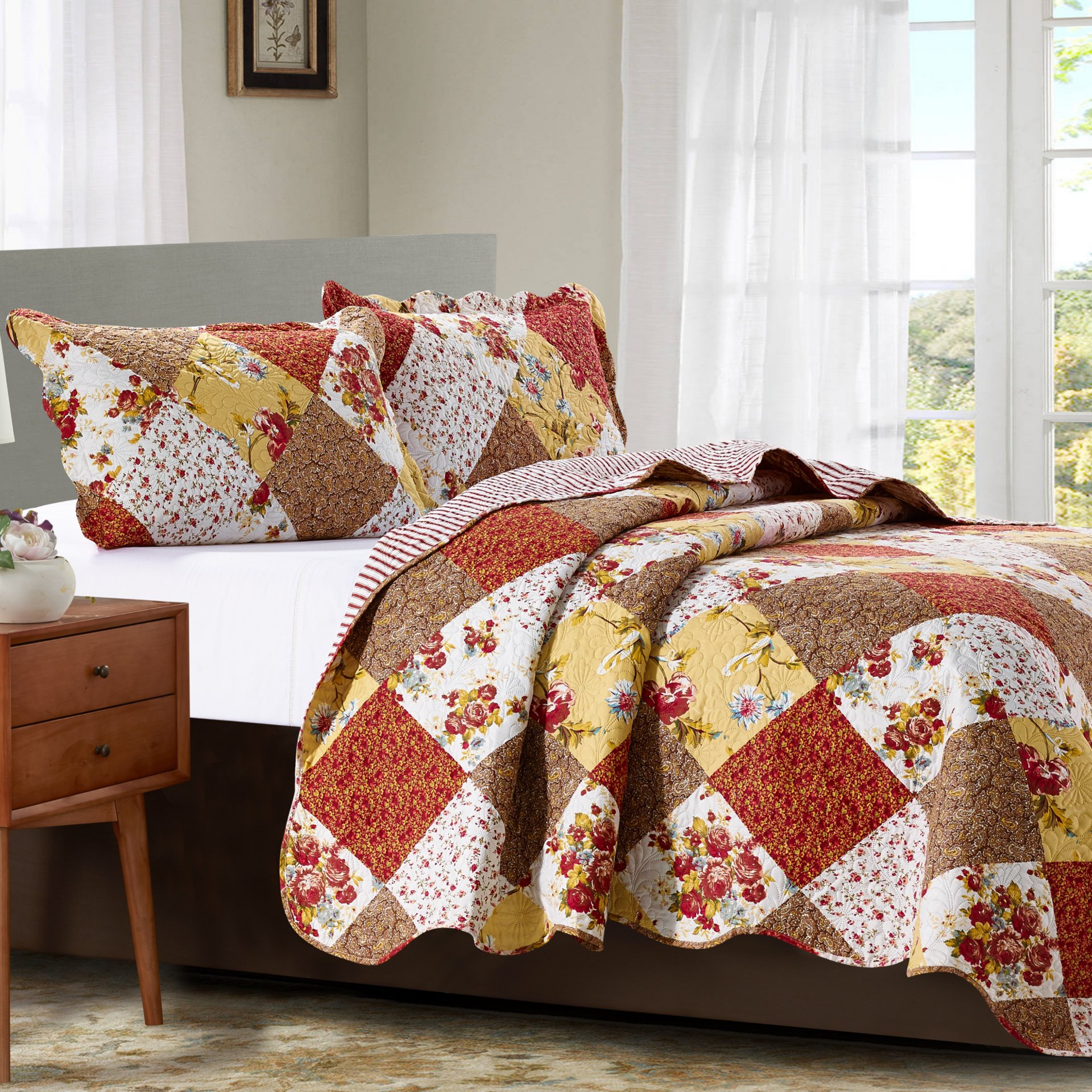 Suzy 3 Piece Quilt Set in Rust, featuring a quilt and two matching pillow shams, showcasing a warm rust color and soft polyester fabric.