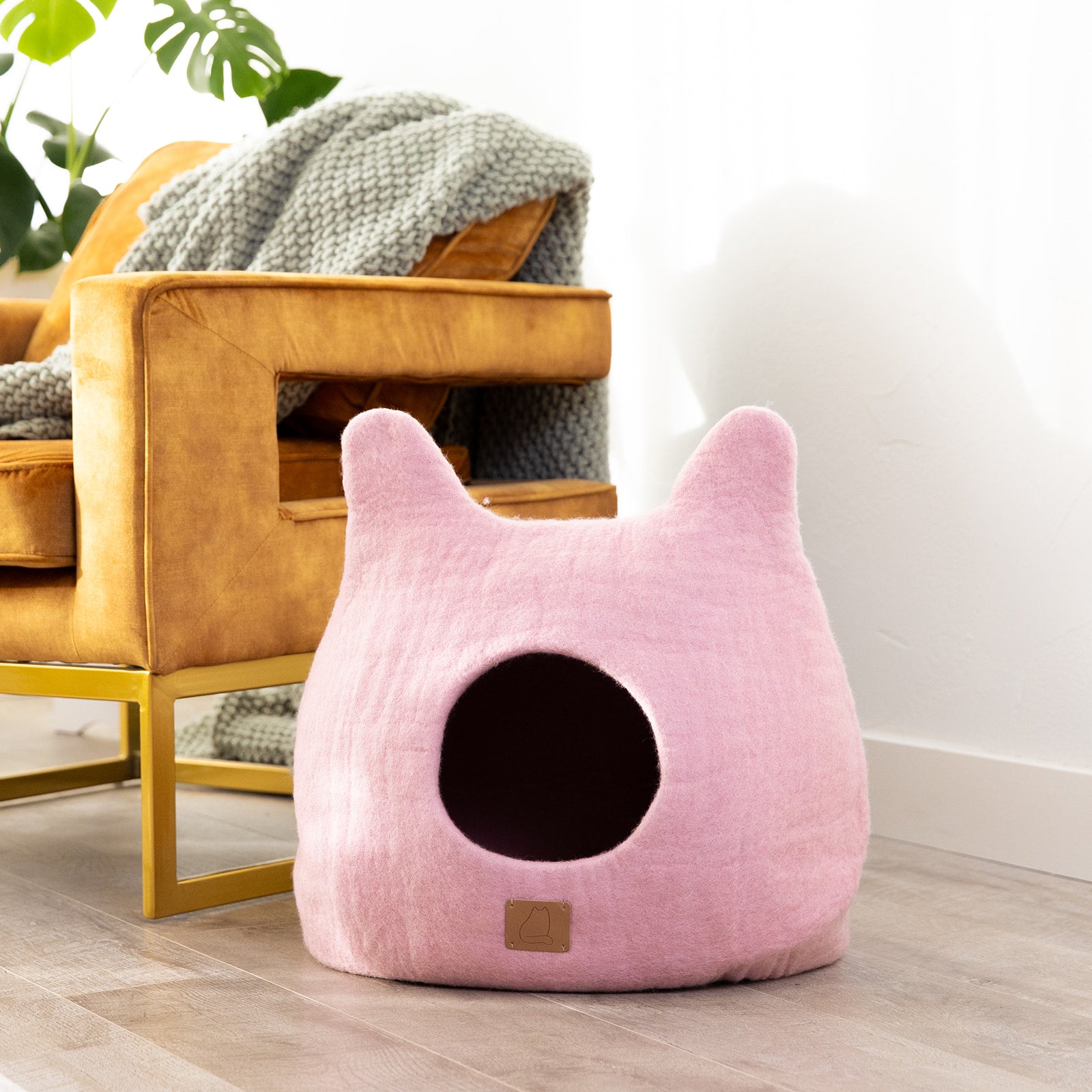 Valentine Pink Ear Style Cave made of luxury felted wool, featuring a cozy peekaboo design, perfect for cats of all sizes.