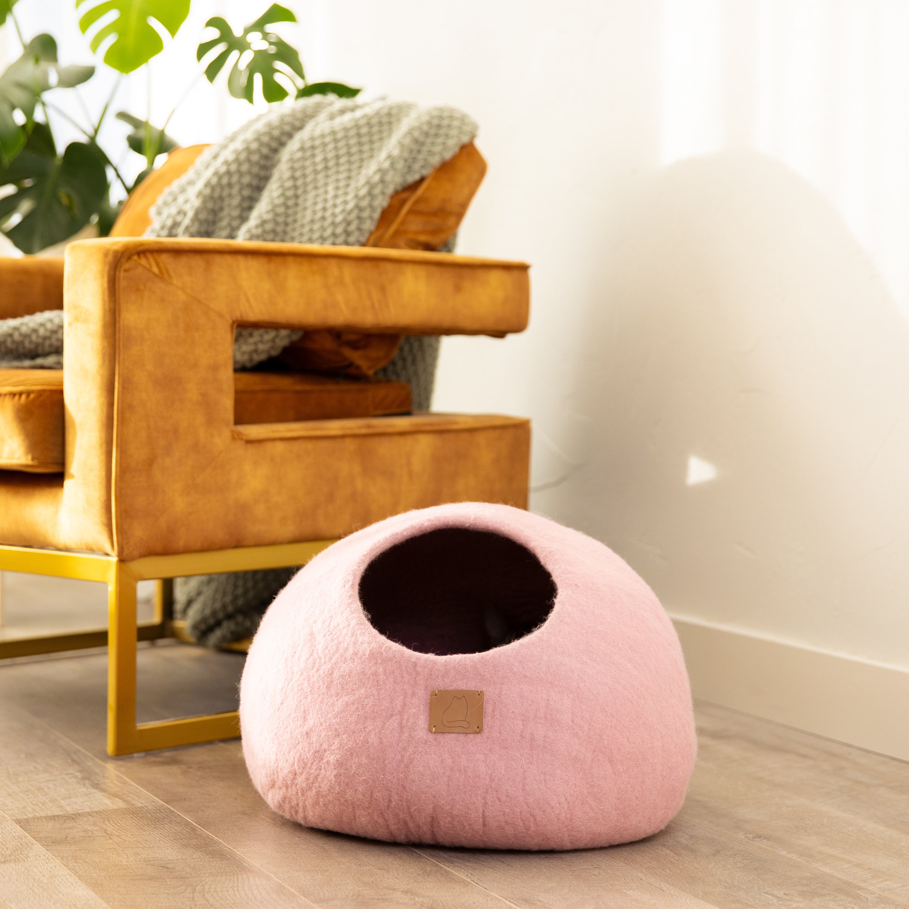 Valentine Pink Round Style Cave, a cozy felted wool cat bed with a peekaboo design, perfect for cats of all sizes.