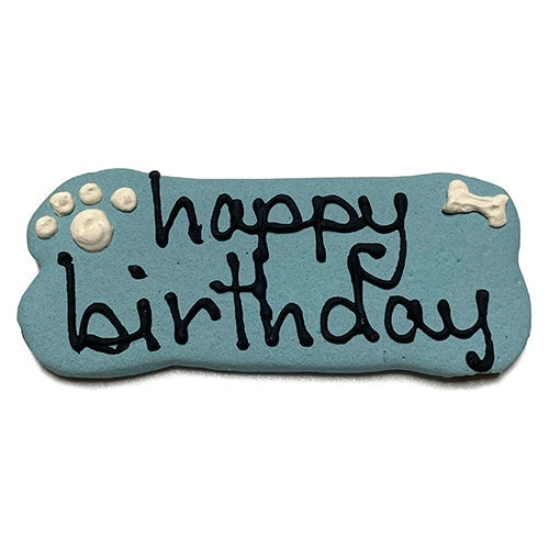 A pack of Birthday Bones dog treats, shaped like bones and topped with yogurt coating, featuring a peanut butter flavor, perfect for celebrating pet birthdays.