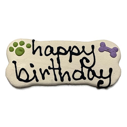 A pack of Birthday Bones dog treats, shaped like bones and topped with yogurt coating, featuring a peanut butter flavor, perfect for celebrating pet birthdays.