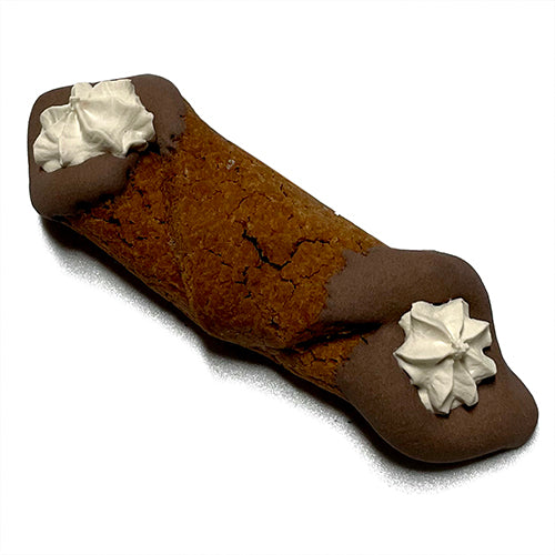 A delicious Cannoli filled with peanut butter, coated in yogurt, and topped with carob chips, presented in a bakery setting.