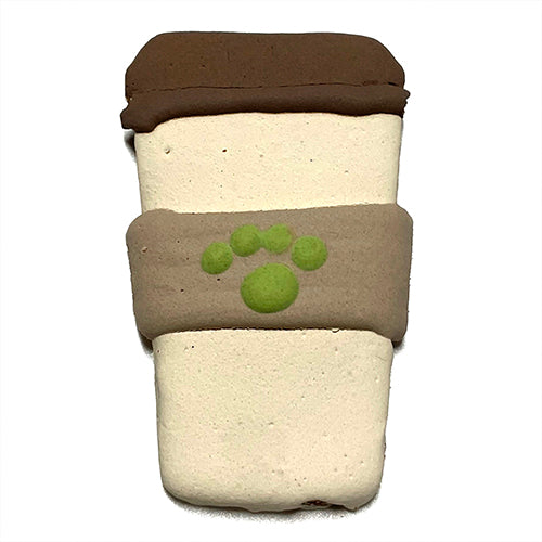 A pack of Coffee Dog Treats featuring peanut butter flavor, shaped like coffee cups, topped with yogurt coating and vegetable coloring.