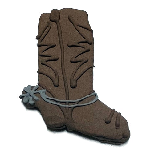 A case of 12 cowboy boot-shaped dog treats made with natural ingredients, featuring a yogurt coating and vibrant vegetable coloring.