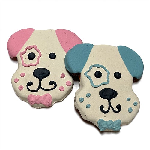 A box of 12 adorable dog head cookies made from peanut butter, featuring a yogurt coating and colorful vegetable coloring.